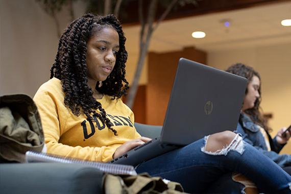 Student working on laptop